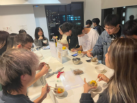 Students gathered to enjoy this homemade dish, creating a meaningful and shared moment.